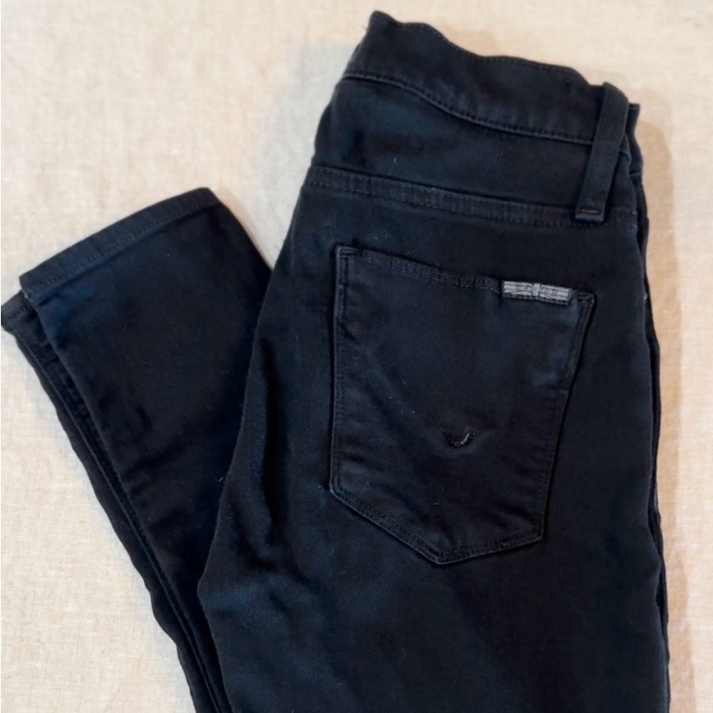 Hudson Low-rise distressed skinny jeans.
